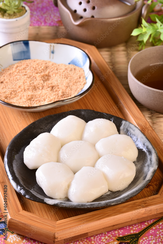 Taiwan style mochi with peanut powder set up on the table Taiwan style mochi with peanut powder set up on the table