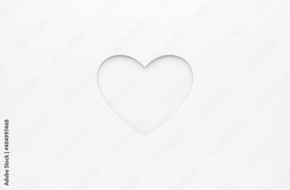 White heart cut from paper