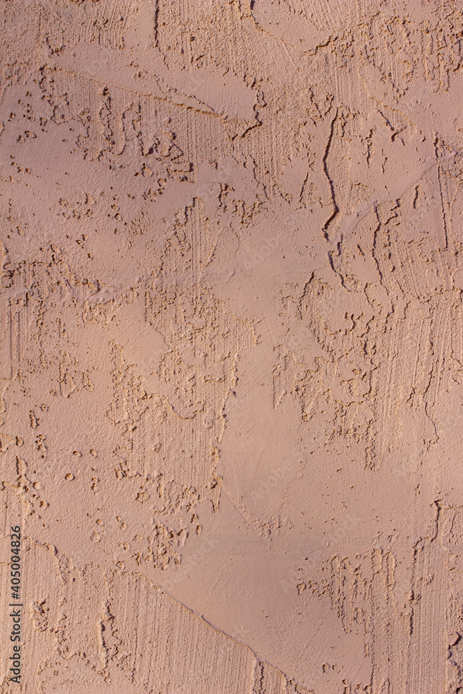 Obraz premium Full frame texture background of a vintage reddish brown stucco wall with attractive texture and faint tree shadows