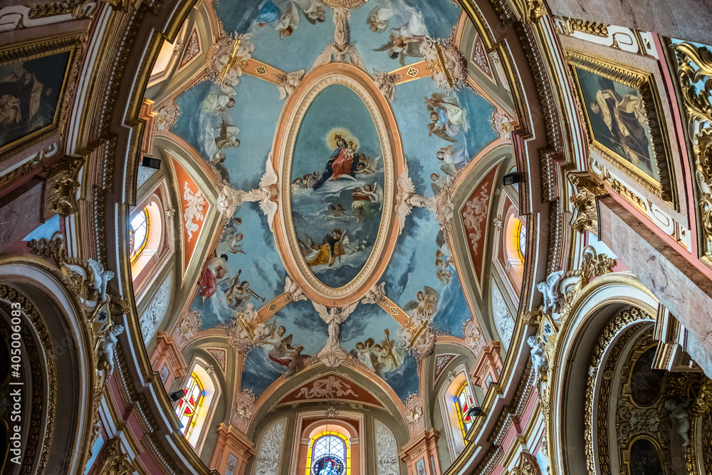 Beautiful interior with paintings and decorations inside of Church in Valletta (or Il-Belt), the capital of the Mediterranean island nation of Malta