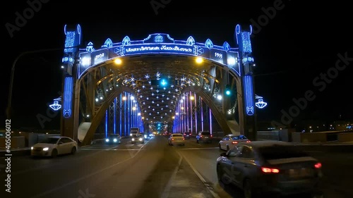 Russia St. Petersburg, 09.01.2021 19.30 pm Bolsheokhtinsky Bridge decorated for the New Year. The Bridge of Emperor Peter the Great. photo