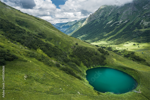 Aerial view of little lake in the mountains of Caucasus Nature Reserve, Russia