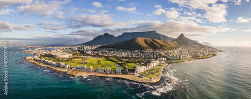 Panoramic aerial view of Lion’s Head, Green Point Stadium, Table Mountain and Mouille Point Lighthouse in summer from Atlantic Seaboard Sea Point Cape Town, South Africa photo