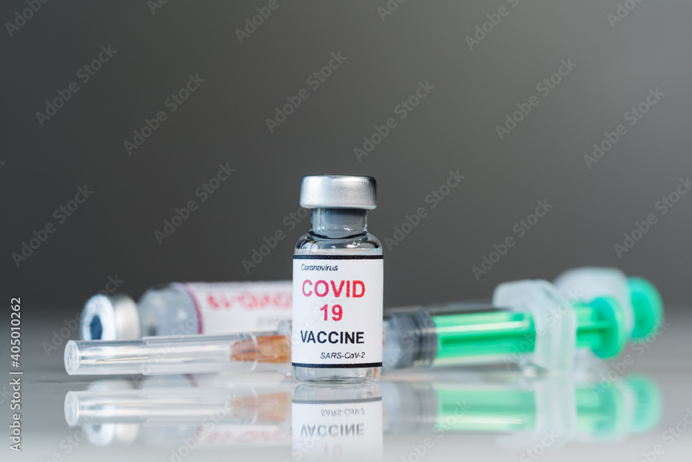 coronavirus covid-19 vaccine bottles and syringe injection coronavirus covid-19 vaccine bottles and syringe injection