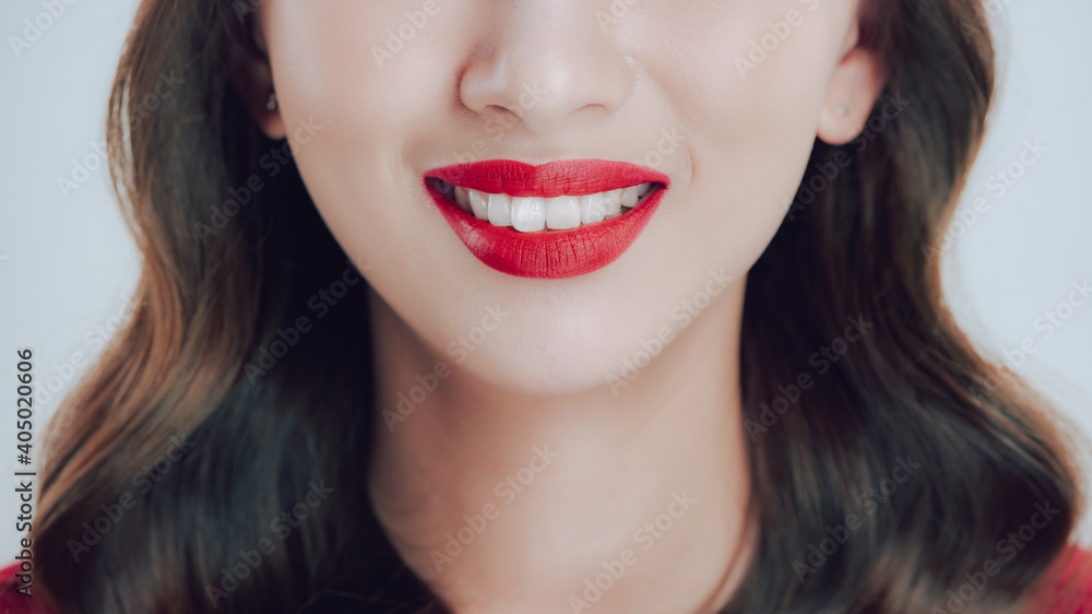 Female lips closeup. Beautiful smile of young fresh woman. Female lips closeup. Beautiful smile of young fresh woman.