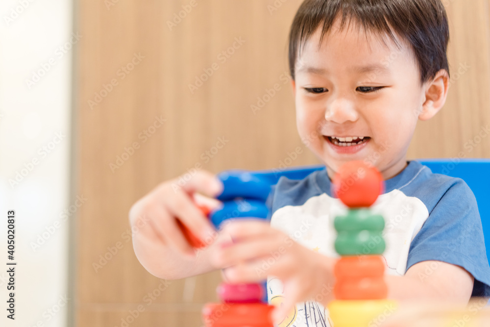 4 years old kid boy online learning class study math or counting number and color.asian boy play colorful wooden toy at home.New normal.education, smart kid boy motor skill.Social distancing.stay home 4 years old kid boy online learning class study math or counting number and color.asian boy play colorful wooden toy at home.New normal.education, smart kid boy motor skill.Social distancing.stay home