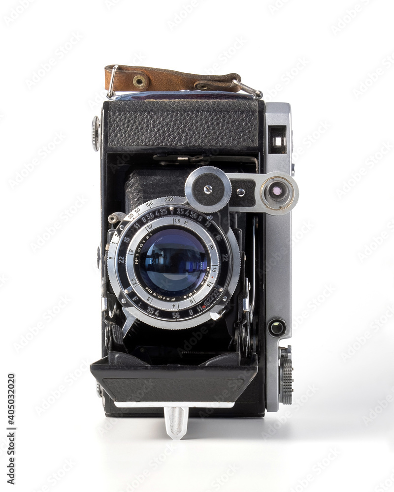 Antique old fashion film camera front view isolated on white background including clipping path Antique old fashion film camera front view isolated on white background including clipping path
