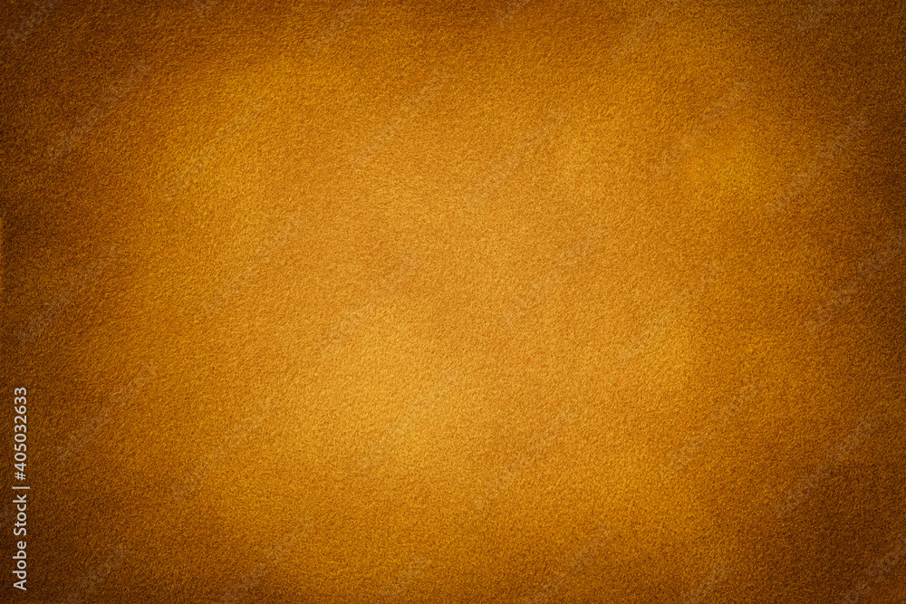 Orange matte background of suede fabric with vignette. Texture of velvet textile Orange matte background of suede fabric with vignette. Texture of velvet textile