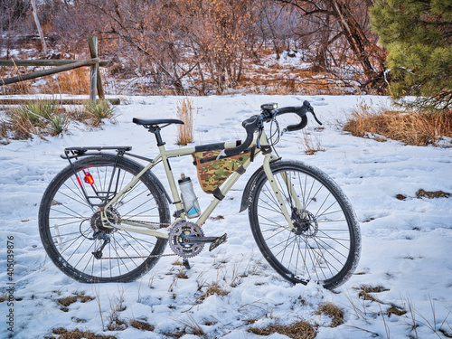 touring bicycle at dusk in late fall or winter scenery on a bike trail in Fort Collins, northern Colorado, recreation and commuting concept