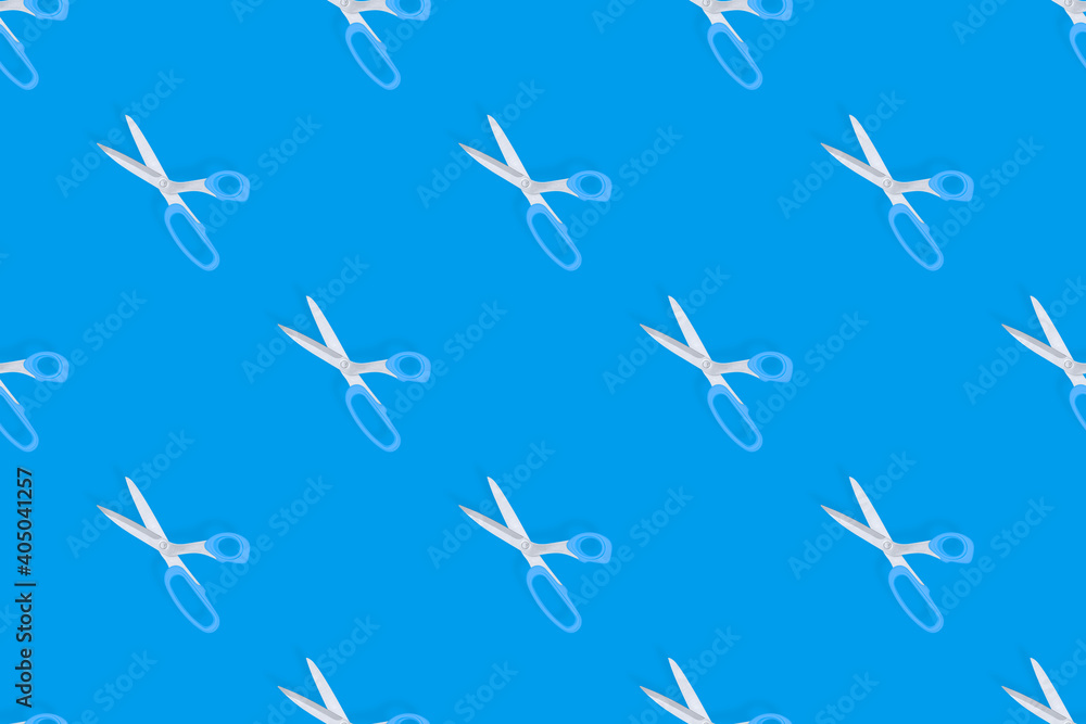 Scissors seamless pattern. Barber scissors against blue background backdrop.