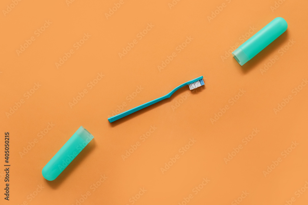 Toothbrush and case on color background Toothbrush and case on color background