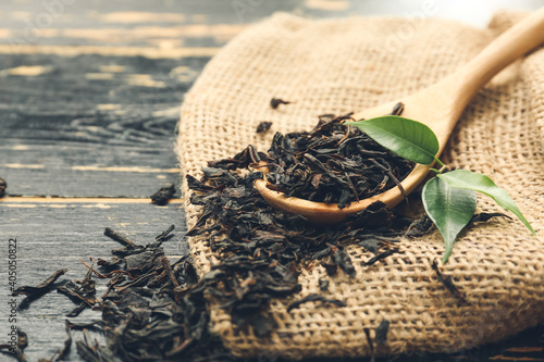 Dried black tea leaves with...