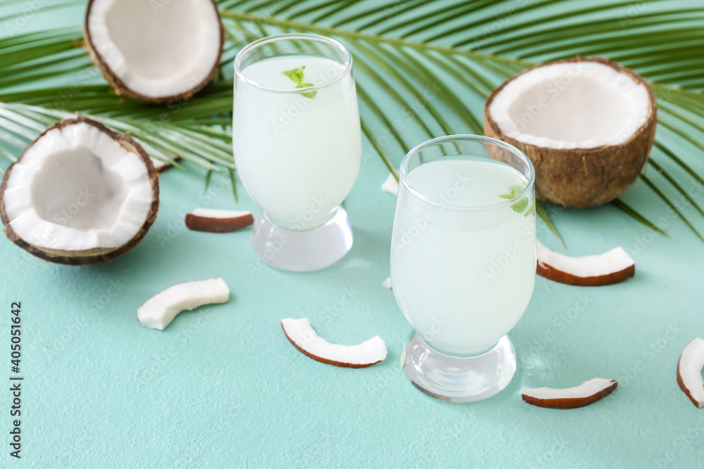 Composition with fresh coconut water on color background Composition with fresh coconut water on color background