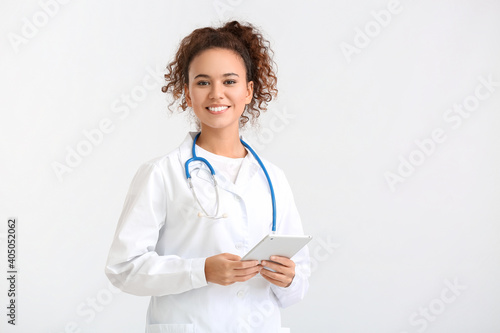Portrait of female doctor w...