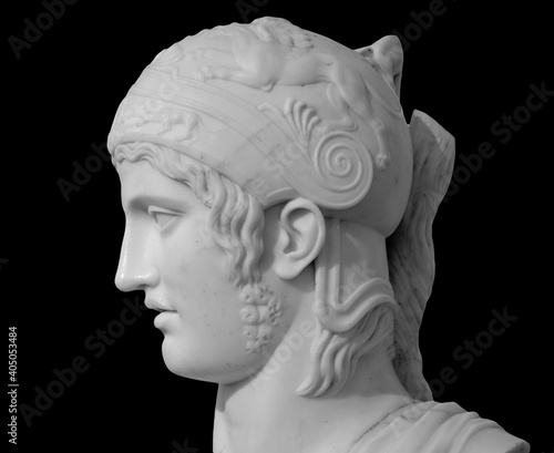Ancient roman statue. Head and shoulders detail of the man sculpture. Antique face statue isolated on black background