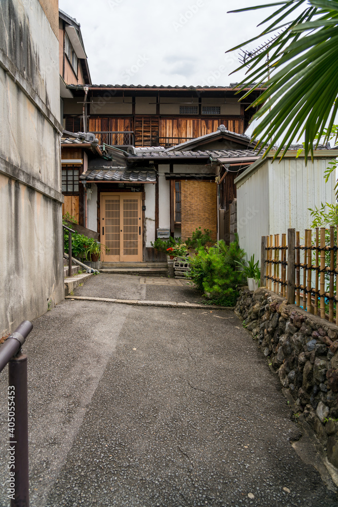 Vertical photo of house with ancient architecture in Kyoto, Japan