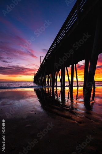 Wallpaper Mural Brown wooden dock on sea during sunset Torontodigital.ca