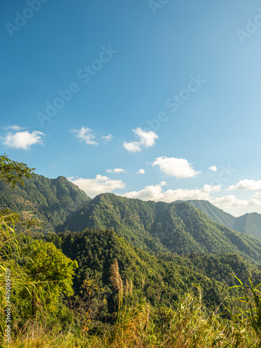 mountain landscape, scenery of high green mountains, blue sky with clouds, beauty world. © Natcha