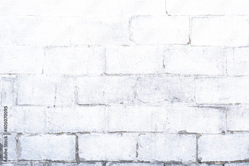 White and grey brick wall texture background with space for text. White bricks wallpaper. White and grey brick wall texture background with space for text. White bricks wallpaper.