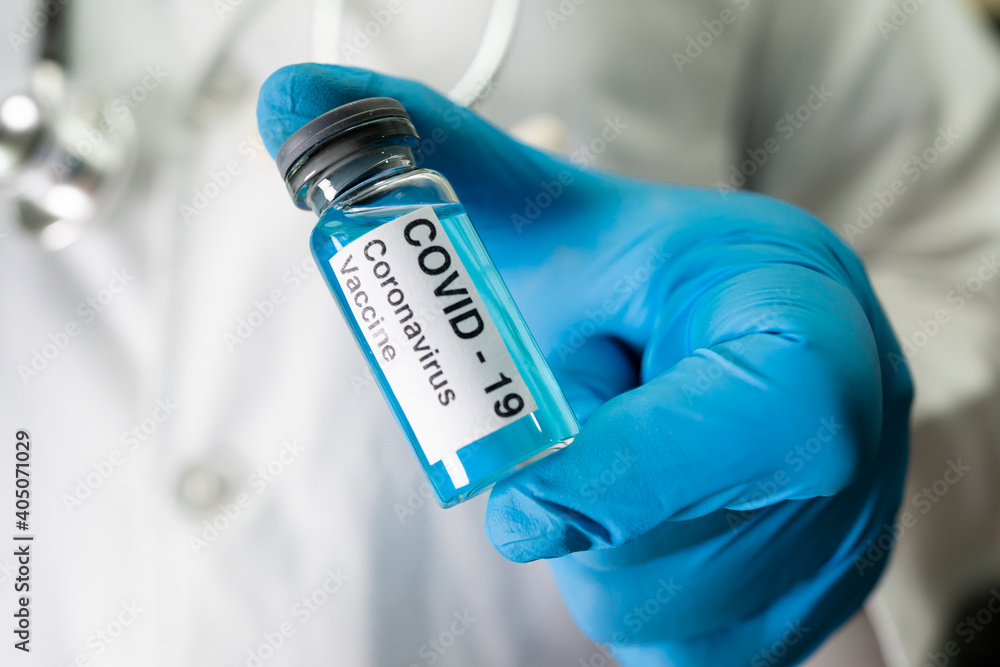 Coronavirus Covid-19 vaccine development medical with syringe for doctor use to treat pneumonia illness patients. Coronavirus Covid-19 vaccine development medical with syringe for doctor use to treat pneumonia illness patients.