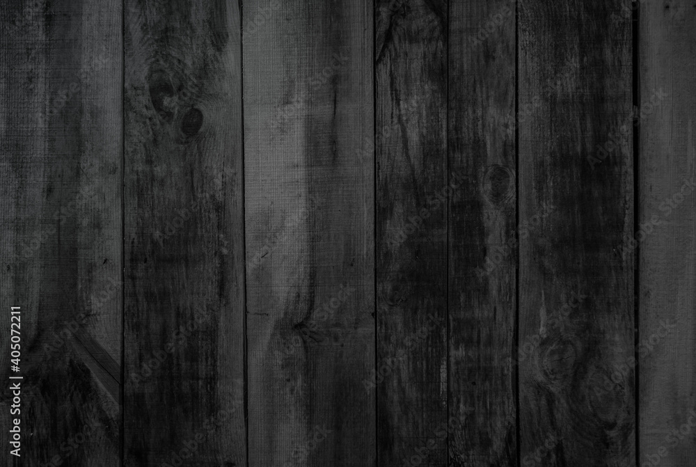 Fototapeta premium Grunge dark old wood texture background. Vintage black wooden board wall antique cracking old style background objects for furniture design. Painted weathered peeling table wood hardwood decoration.