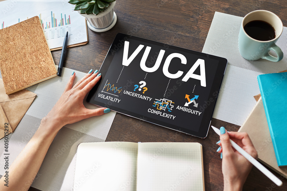 VUCA world concept on screen. Volatility, uncertainty, complexity, ambiguity. VUCA world concept on screen. Volatility, uncertainty, complexity, ambiguity.