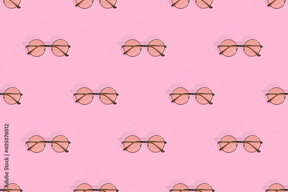 Glasses seamless pattern. Glasses for improving vision on a pink background. Glasses seamless pattern. Glasses for improving vision on a pink background.