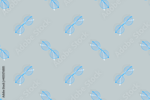 Glasses seamless pattern. Glasses for improving vision on a gray background.