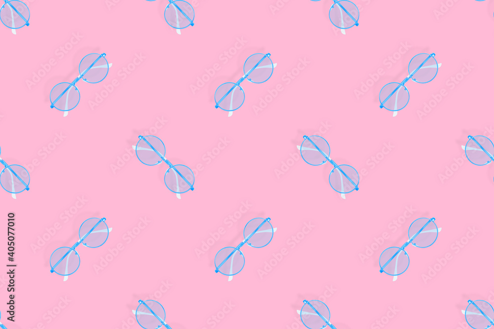 Glasses seamless pattern. Glasses for improving vision on a pink background. Glasses seamless pattern. Glasses for improving vision on a pink background.