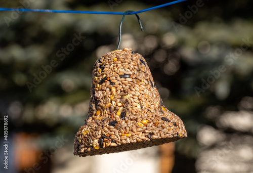 Bell from various grains, a delicacy for all the birds in the garden © wjarek