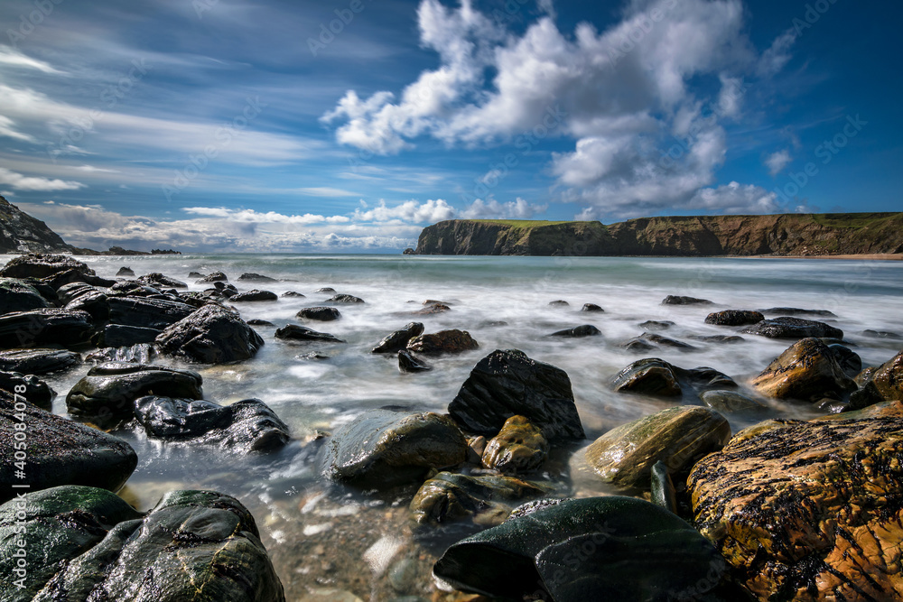 Slow shutter exposure of the Silver Strand, a horse-shoe shaped beach situated at Malin Beg, near Glencolmcille, in south-west County Donegal, Ireland