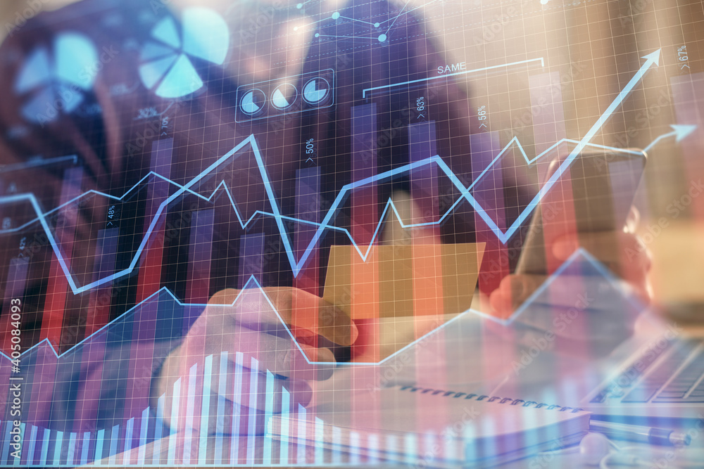 Double exposure of man's hands holding and using a phone and financial graph drawing. Analysis concept. Double exposure of man's hands holding and using a phone and financial graph drawing. Analysis concept.