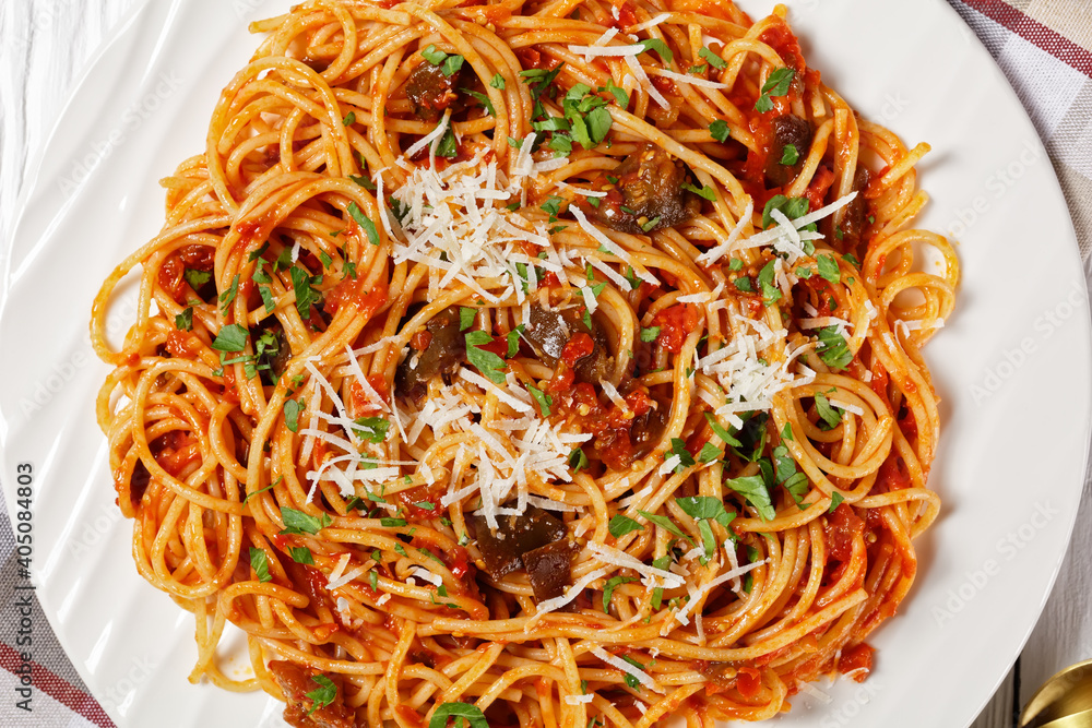 pasta alla norma on a white plate pasta alla norma on a white plate