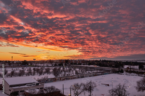 Sunset in the snow-covered   guilas district of Madrid  after the passage of the storm Filomena. Spain