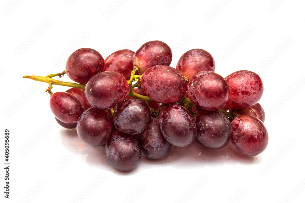 Real and unedited texture of red grapes in isolated white background with their shadow. Real and unedited texture of red grapes in isolated white background with their shadow.