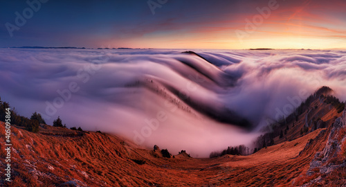 Sunset in the autumn mountains above the clouds during the weather inversion Fatra mountains in Slovakia, beautiful landscape