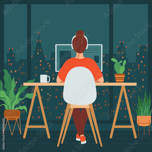 Woman is sitting at a computer in a room with a large window. Concept of remote work, freelancing, teaching, e-learning, from home office at night, workplace with indoor plants. Vector illustration 
