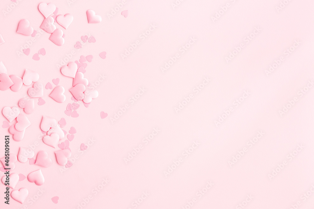 Valentine's Day background. Pink hearts on pastel pink background. Valentines day concept. Flat lay, top view, copy space