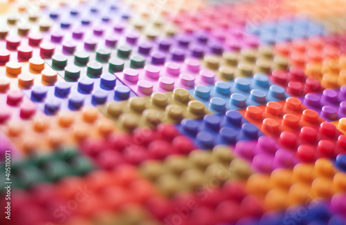 Many colorful plastic building blocks toy bricks