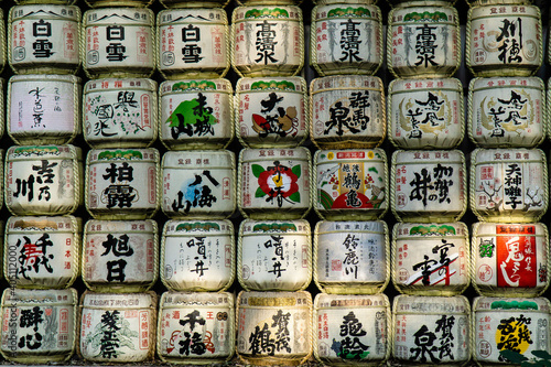 Photos Big sake barrels places as offerings in a temple in Tokyo, Japan
