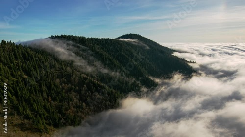 Sunset in a Carpathian mountain valley with wonderful gold light on a hills - Time lapse photo