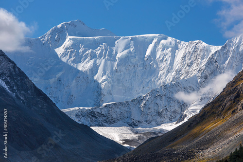 A mountain covered with snow. Glacier on a high mountain. © Sergei