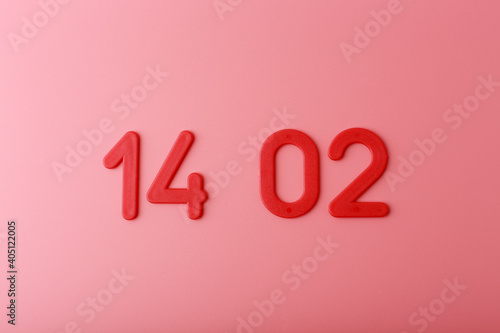 Red numbers 14 02 on bright pink background. Concept of Happy Valentine's day 