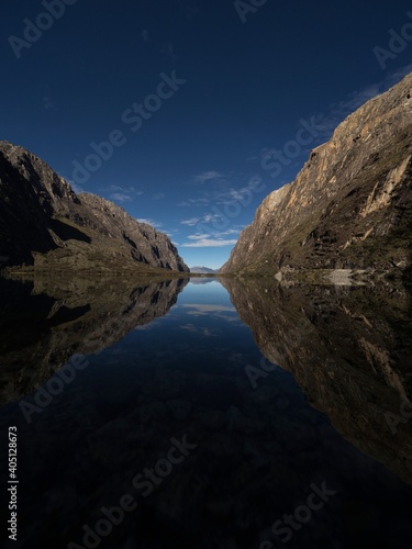 Panorama reflection of andean alpine mountain lake Laguna Chinancocha Llanganuco Huaraz Yungay Ancash Peru photo