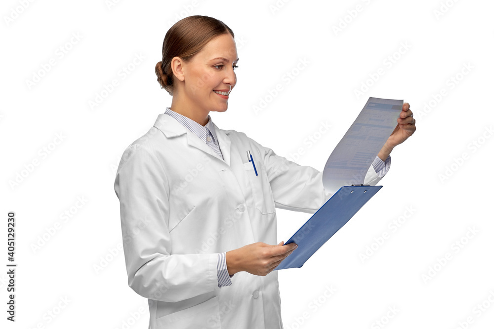 medicine, profession and healthcare concept - happy smiling female doctor in white coat with clipboard reading medical report medicine, profession and healthcare concept - happy smiling female doctor in white coat with clipboard reading medical report
