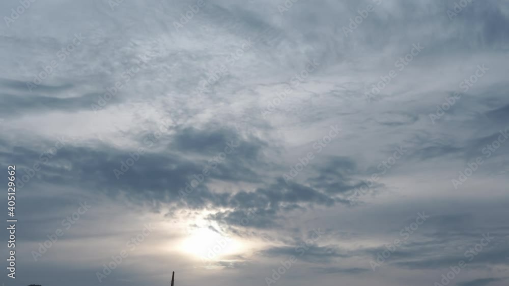 Dramatic for rain. clouds in the open air become very few and the clouds of cotton in the sky wander together. Heavenly clouds open sky and sunlight, sunbeam rays and flare shine through thick rainy c Dramatic for rain. clouds in the open air become very few and the clouds of cotton in the sky wander together. Heavenly clouds open sky and sunlight, sunbeam rays and flare shine through thick rainy c