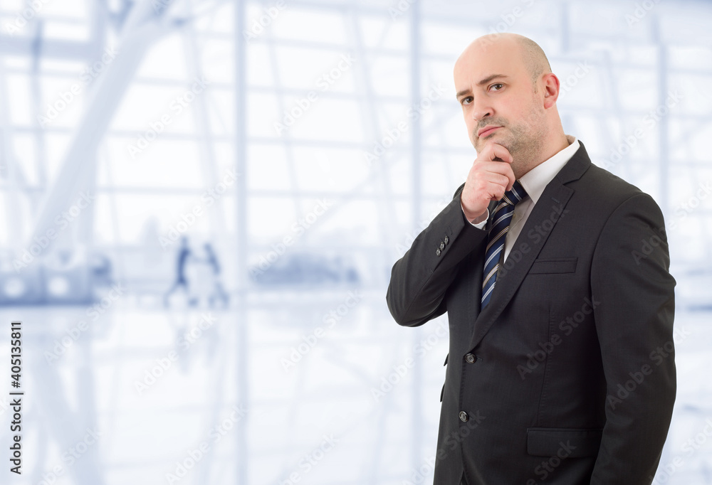 businessman thinking, at the office businessman thinking, at the office