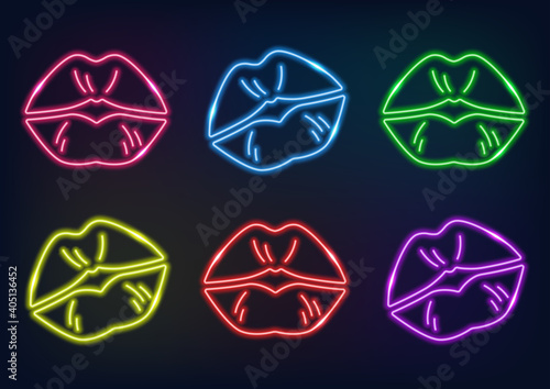 Neon sign. Set of lips in neon style. Laser glowing lines on a dark background.