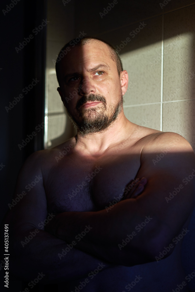 Early morning portrait lit by sun through window Early morning portrait lit by sun through window