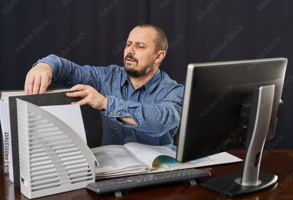 Businessman working at his computer Businessman working at his computer